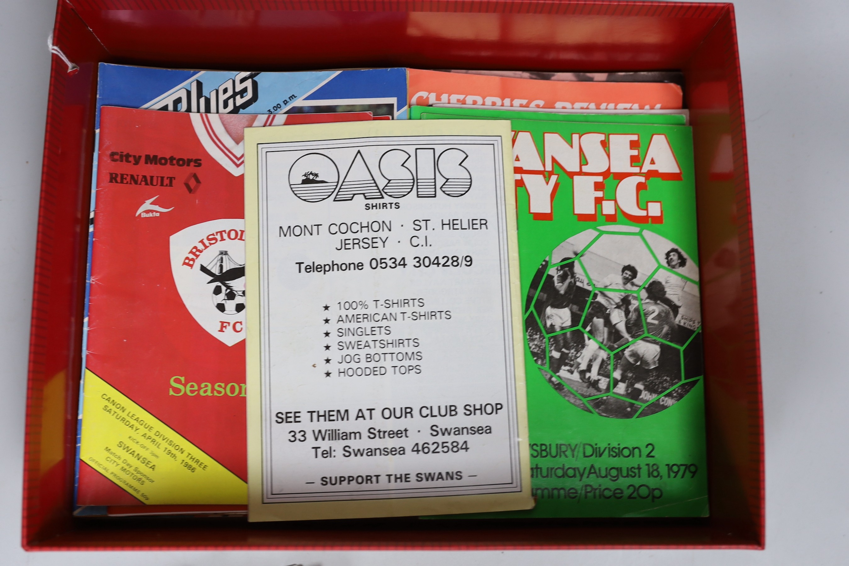 The Athletic News Football Annual 1892 and a quantity of 1980’s Swansea City football programmes.
